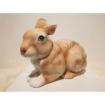 Hare crouching red colored, porcelain figure 32x24cm