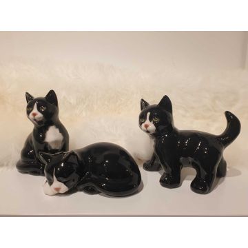 Cat trio black and white standing/sitting/lying porcelain figurine up to 15cm