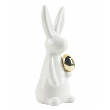 Easter bunny with gold egg, 21cm ceramic figurine